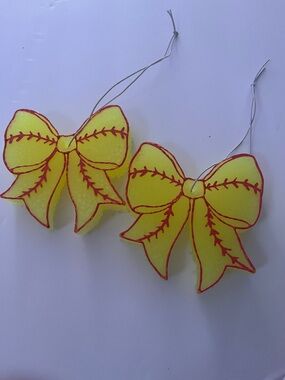 Two barely used softball car scents